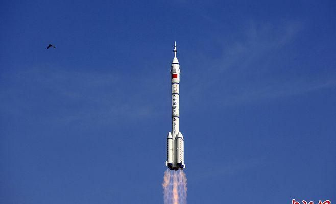 神舟五号载人飞船的发射时间是在空中飞行时间是空中飞行距离是